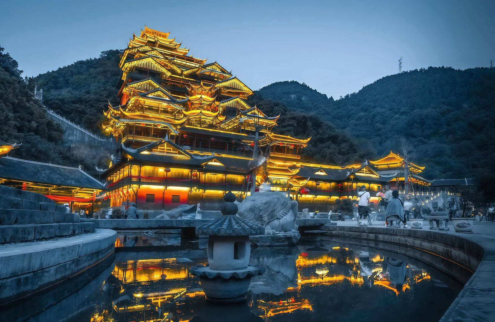 Jiuli City golden pavilions at dusk on the Wulong and Wujiang route