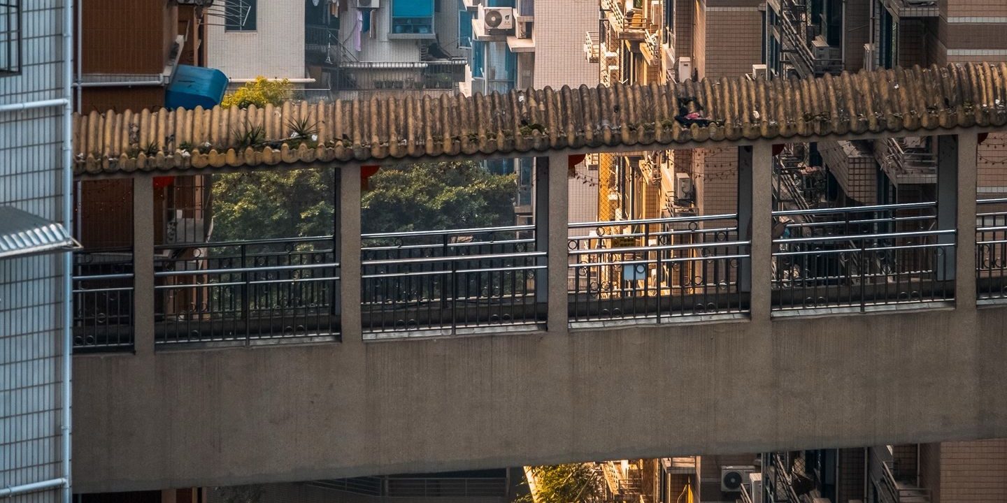 A covered footbridge between high-rise blocks in the Kuixinglou area