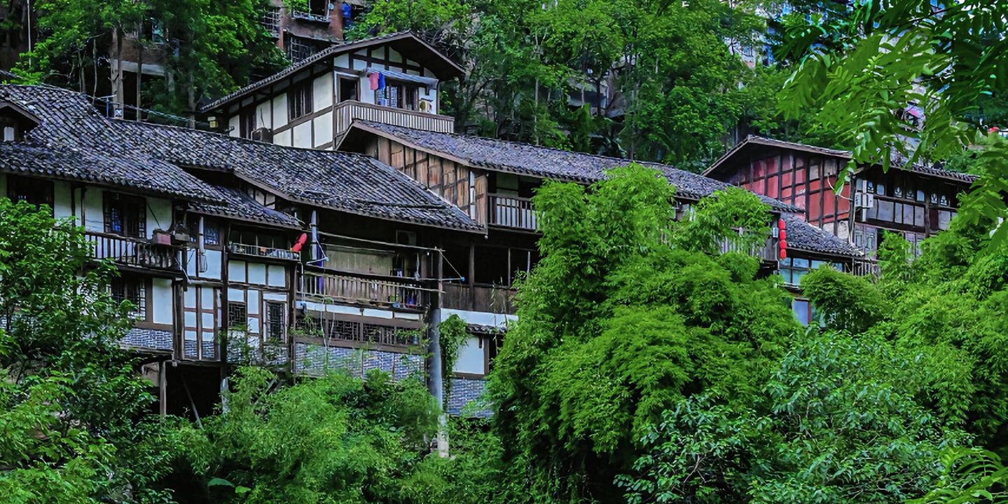 Old timber houses of Zhongshan Ancient Town among the trees in Jiangjin