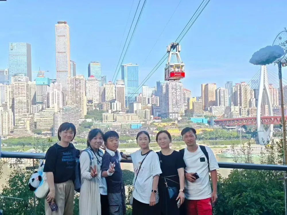 Anjia guests at a Chongqing cityscape viewpoint
